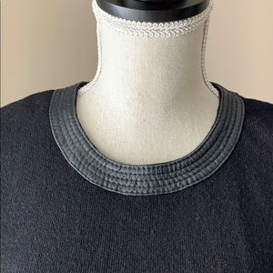 Leather trim at neck sleeveless sweater